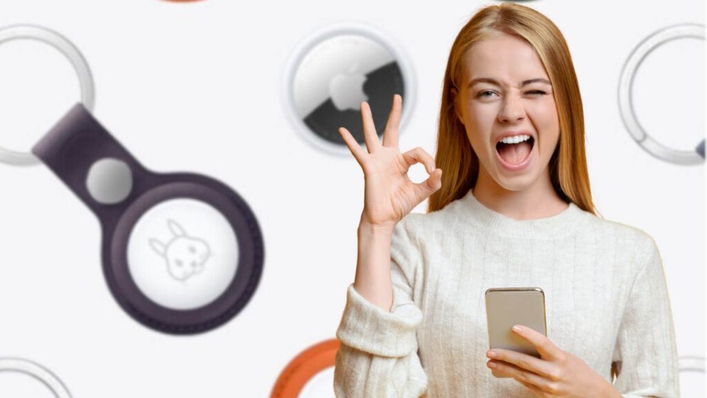 airtag apple donna smartphone in mano gesto ok